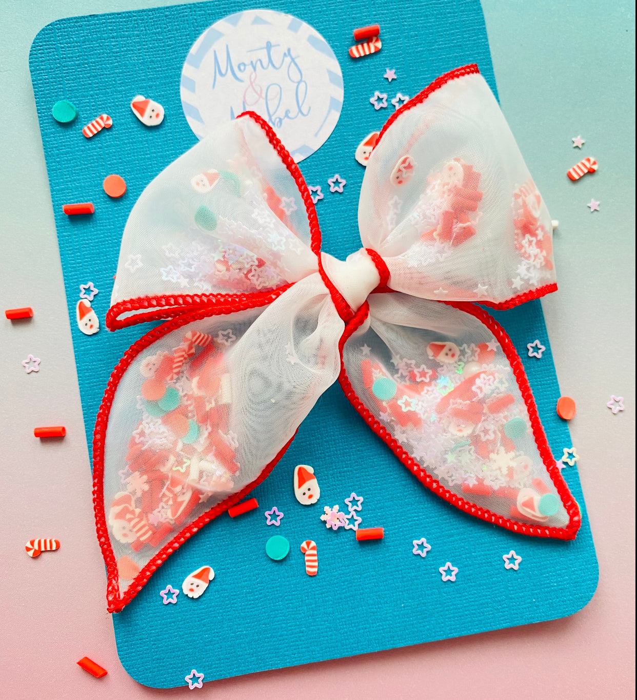 Sale: Father Christmas Small Celebration Bow Filled With Glitter