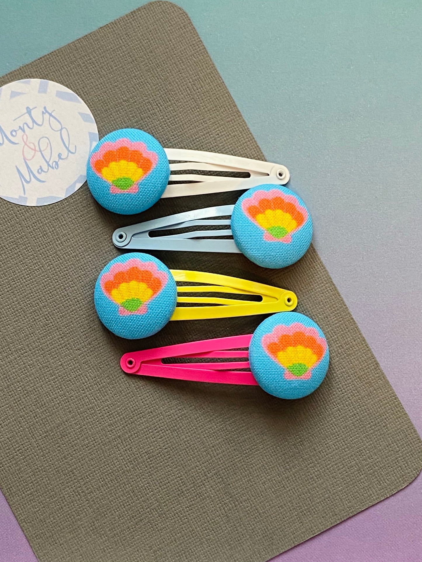 Rainbow Shells on Blue