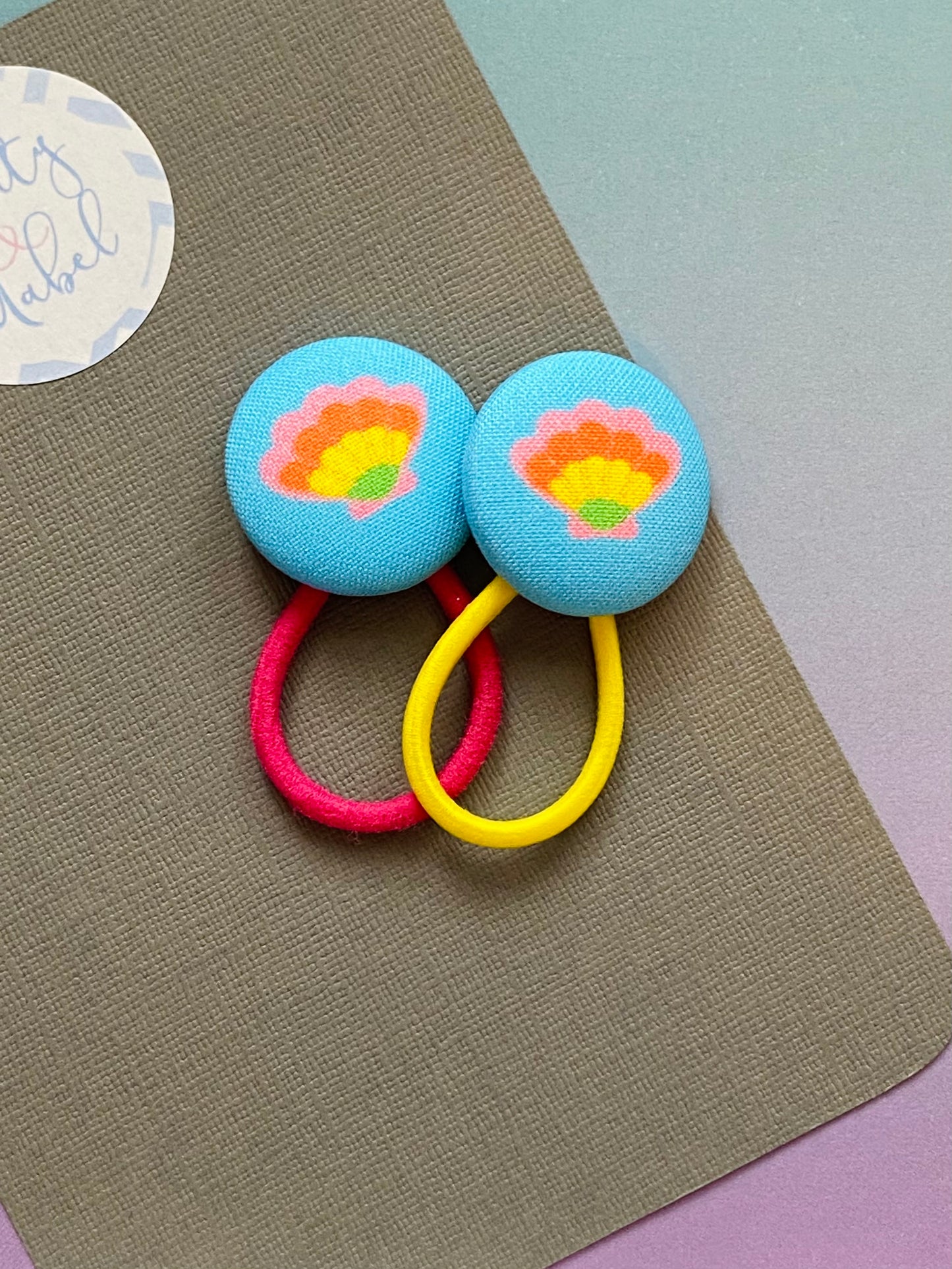 Rainbow Shells on Blue
