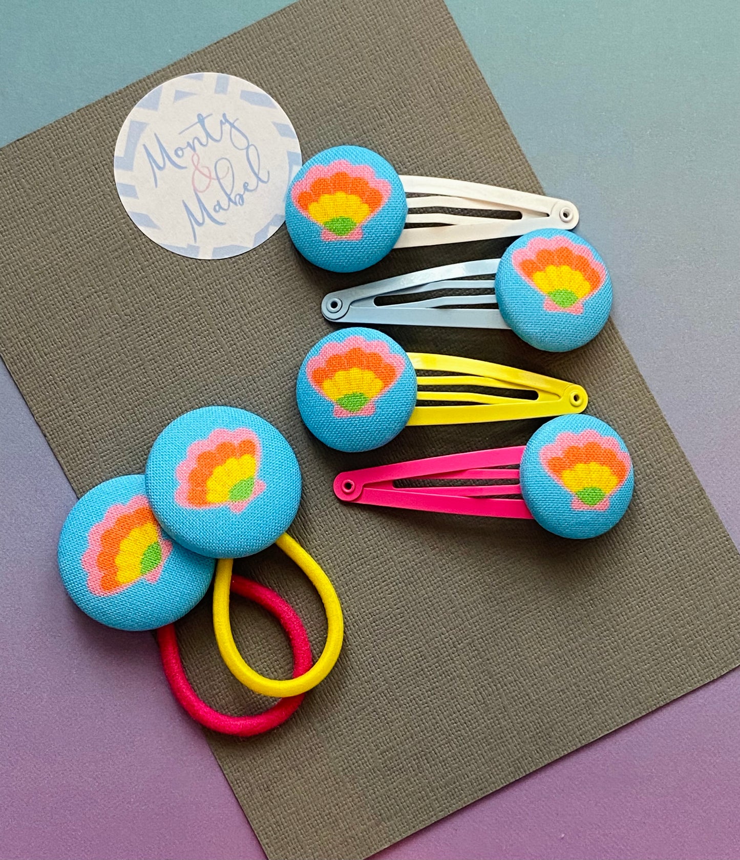 Rainbow Shells on Blue