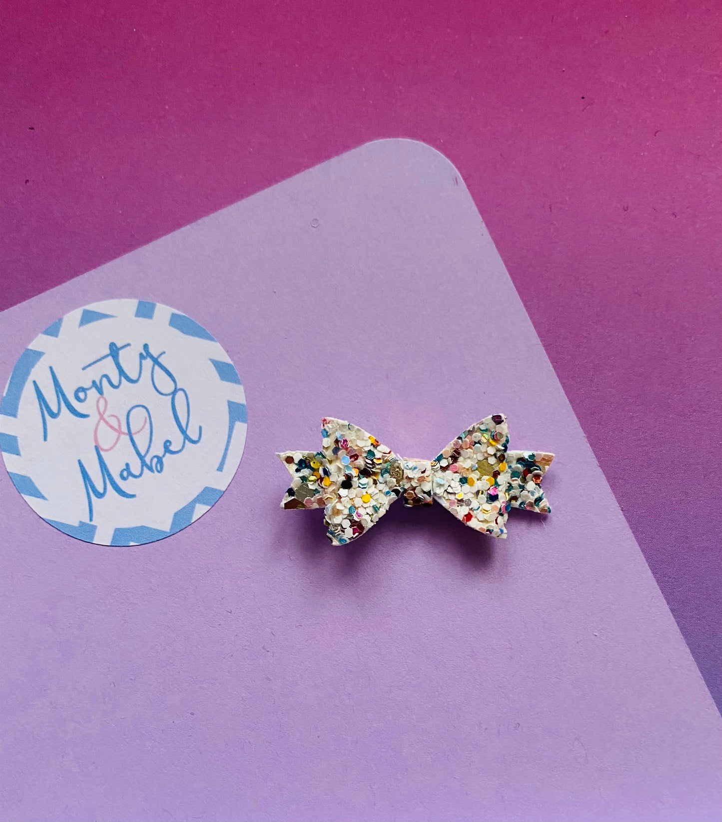 Sale: Light Speckled Glitter Diddy Bow Fringe Clip