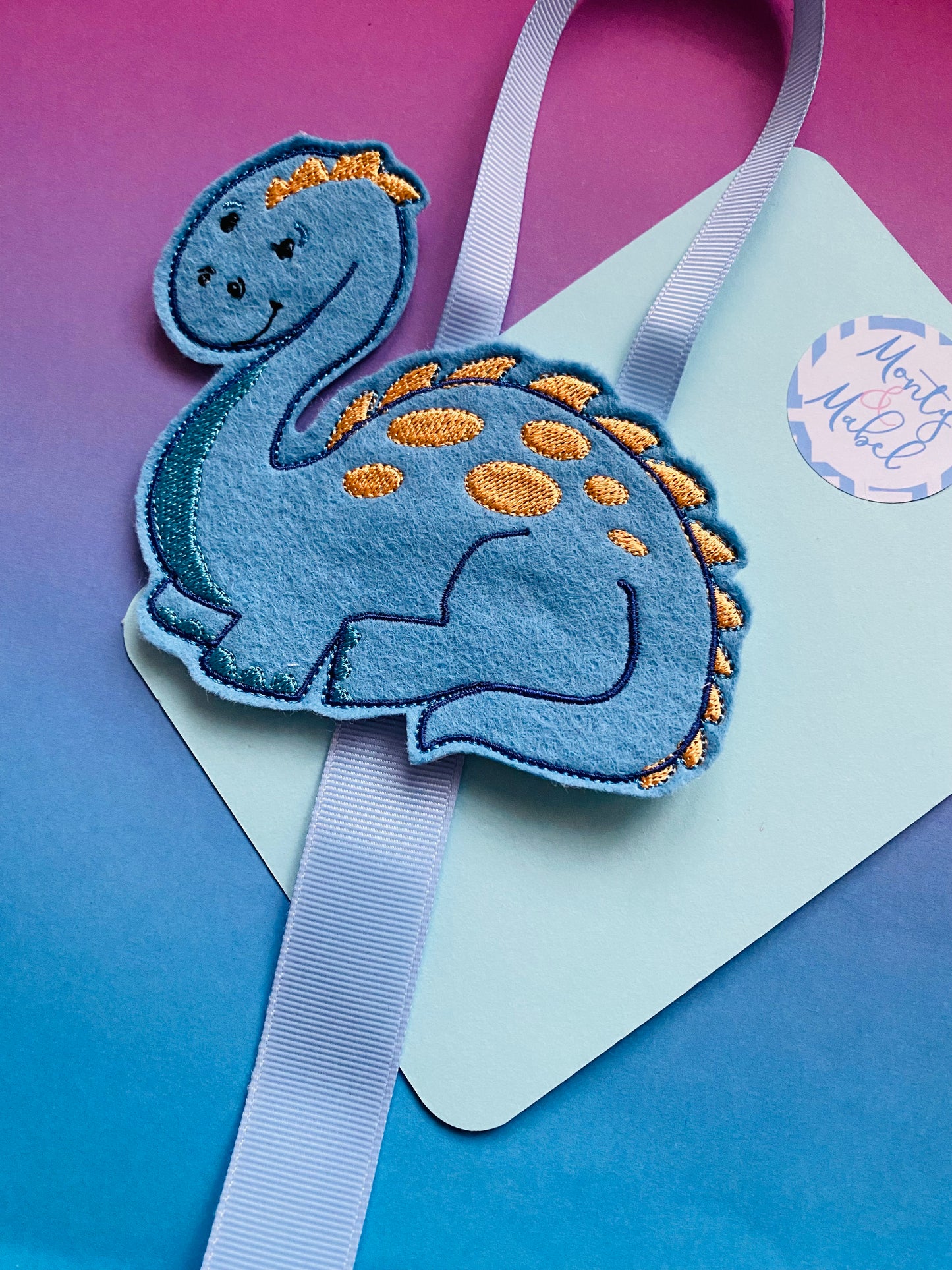 Sale: Dinosaur Holder (1 Hanging Ribbon)