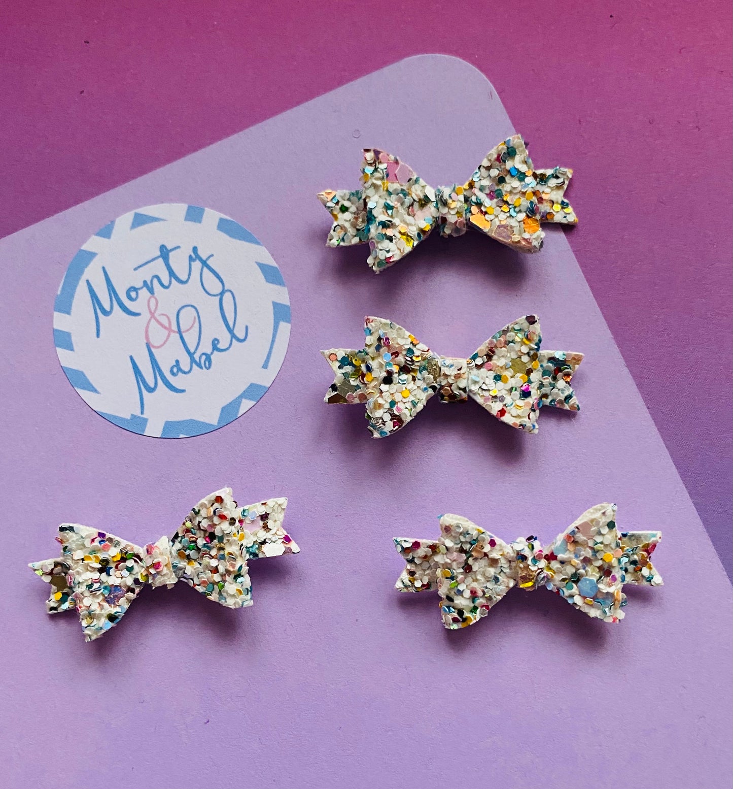 Sale: Light Speckled Glitter Diddy Bow Fringe Clip