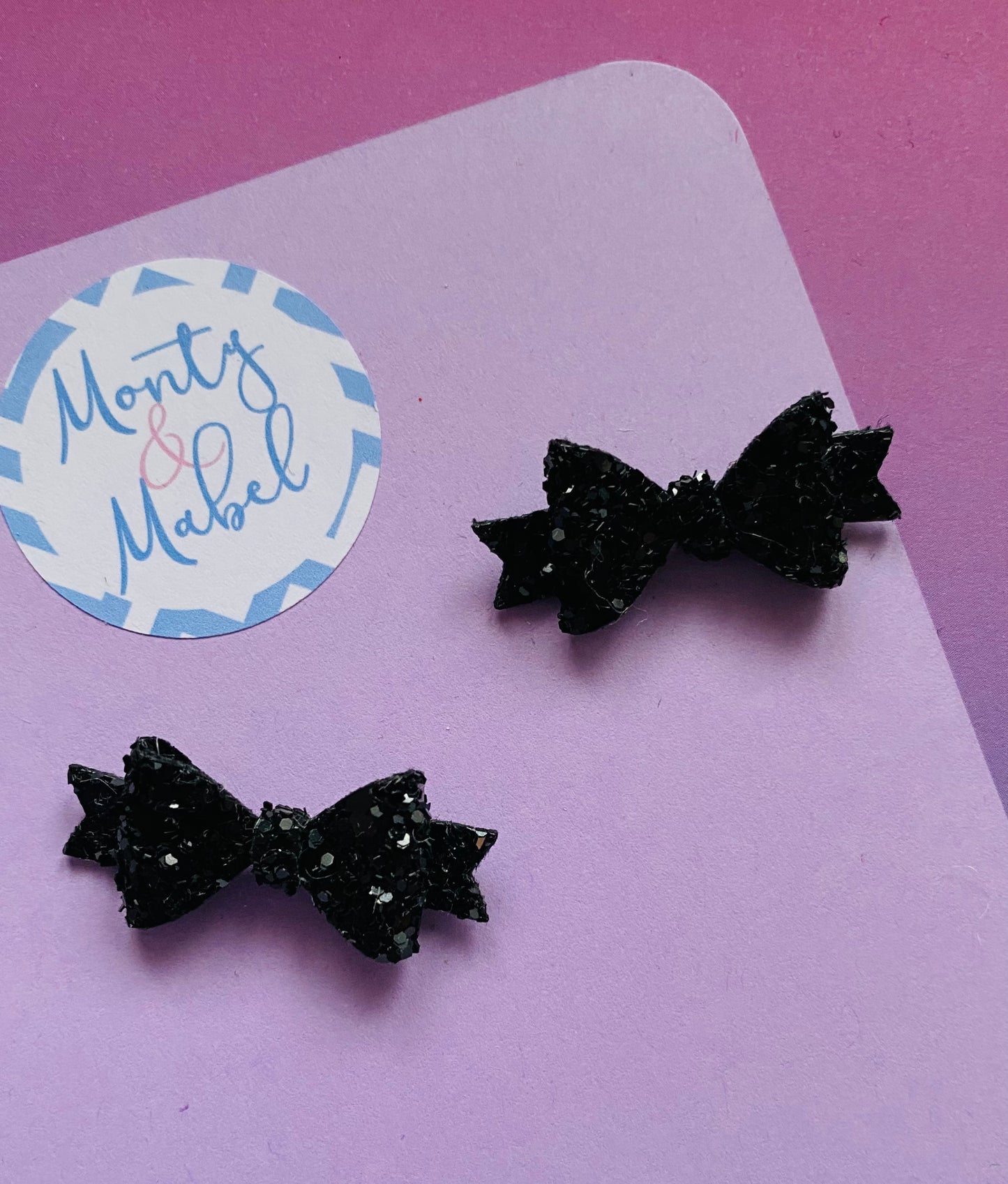 Sale: Black Glitter Diddy Bow Fringe Clip