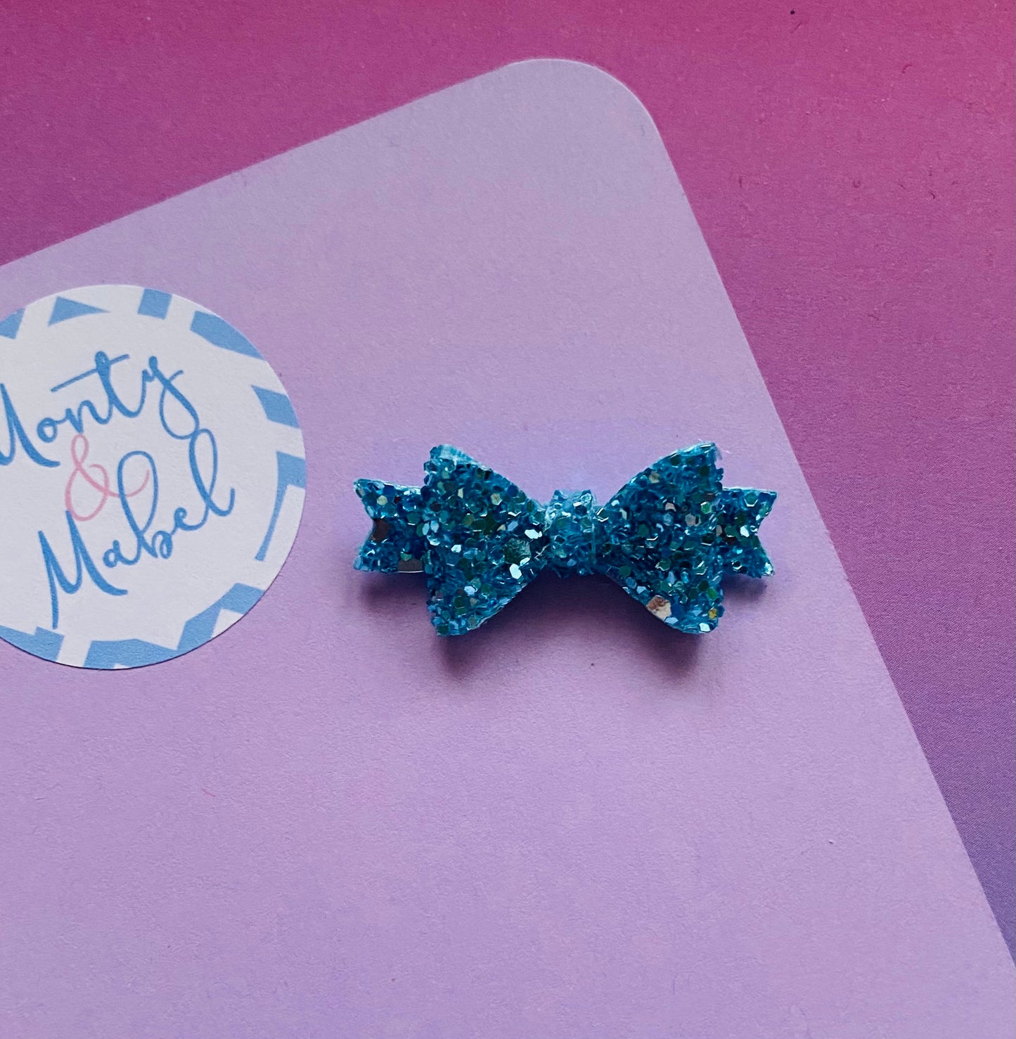 Sale: Turquoise Glitter Diddy Bow Fringe Clip